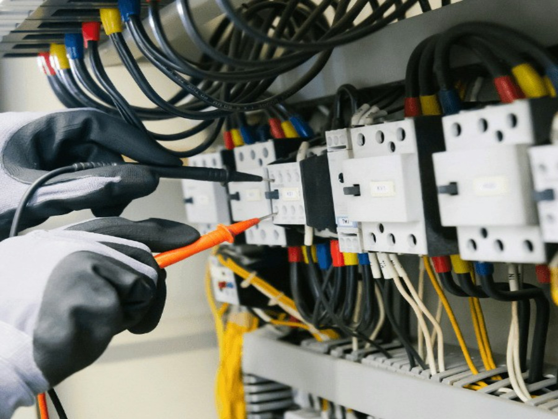 Electrical equipment being tested with a multimeter